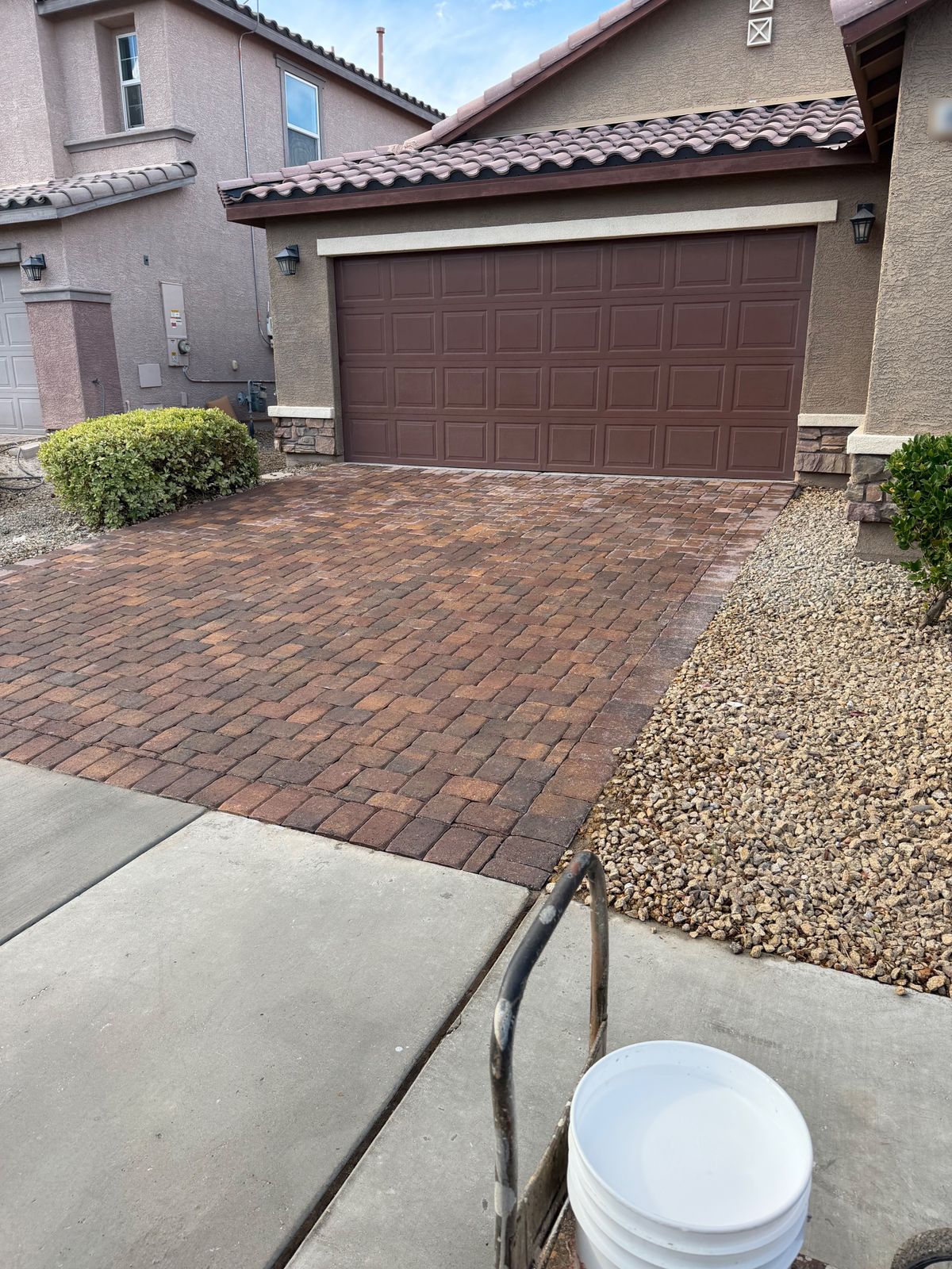 Driveway with fresh sealer going down