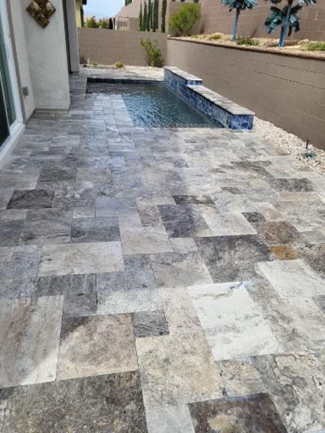 Travertine around a lap pool