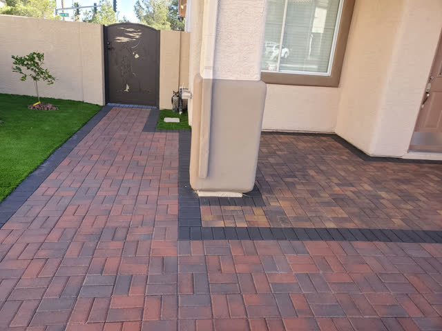 Red and charcoal paver entry walkway