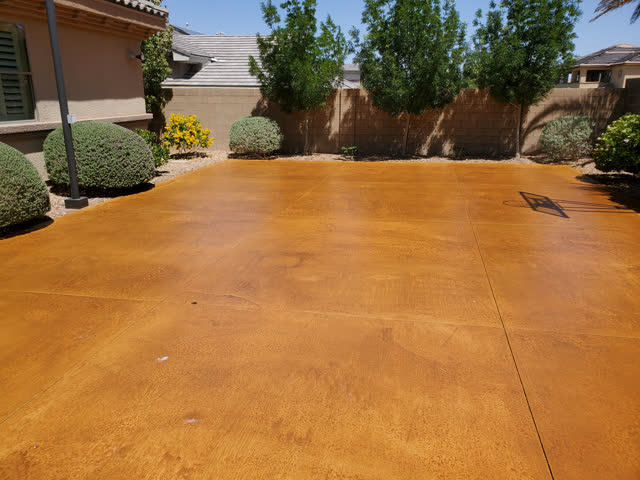Concrete patio with an amber color stain