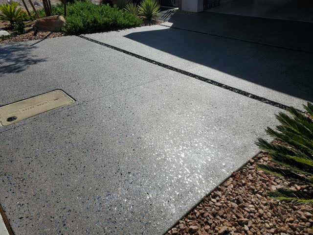 Exposed aggregate concrete with a fresh seal