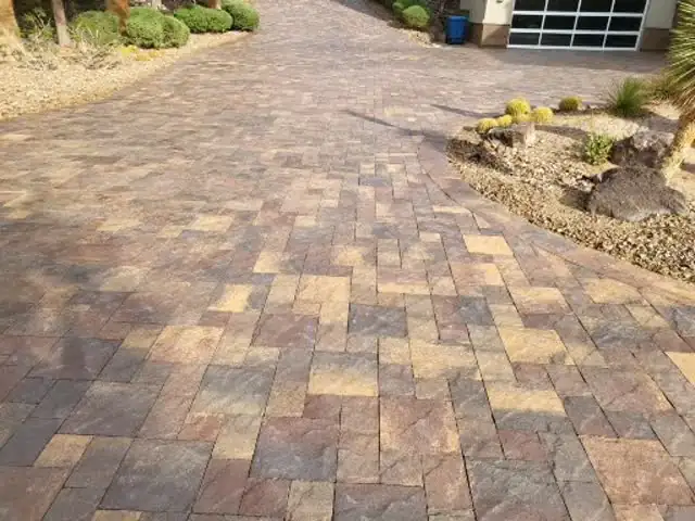Paver driveway with desert landscaping