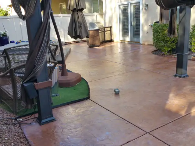 Old stamped concrete patio looking new again