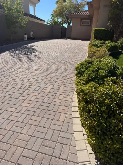 Sealed paver driveway at a custom home