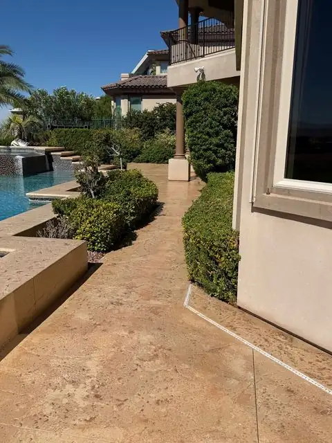 Stamped concrete pool walkway, stained and sealed