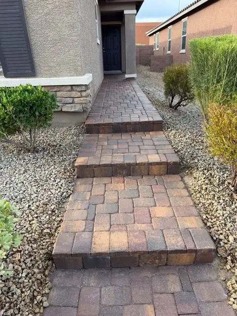 Sealed paver walkway and steps to the front door