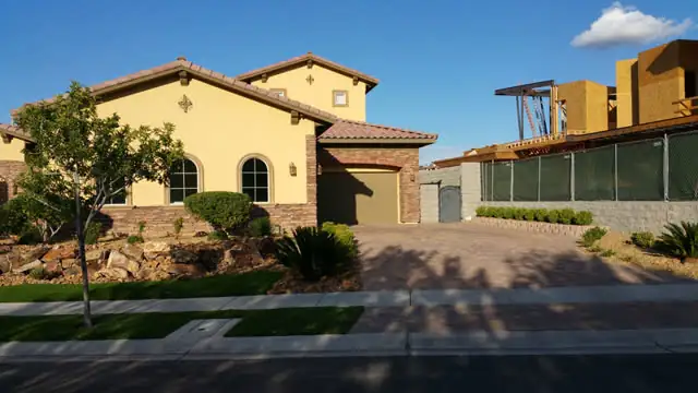 Sealed driveway at a Mediterranean-style home